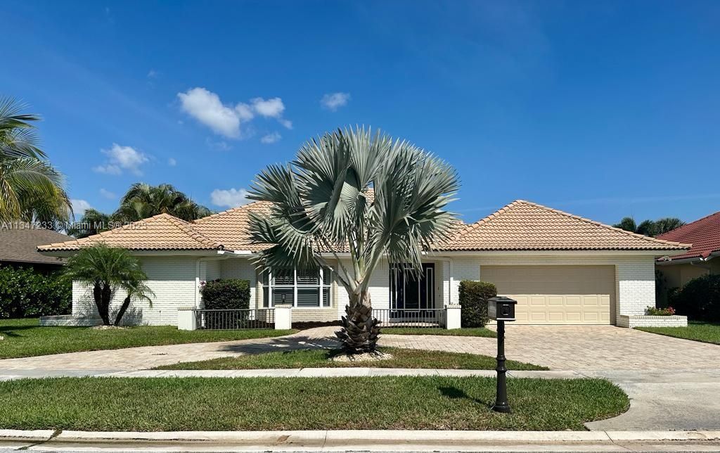 Photo of 2855 Biarritz Dr, Palm Beach Gardens, FL 33410 (MLS # A11347233)