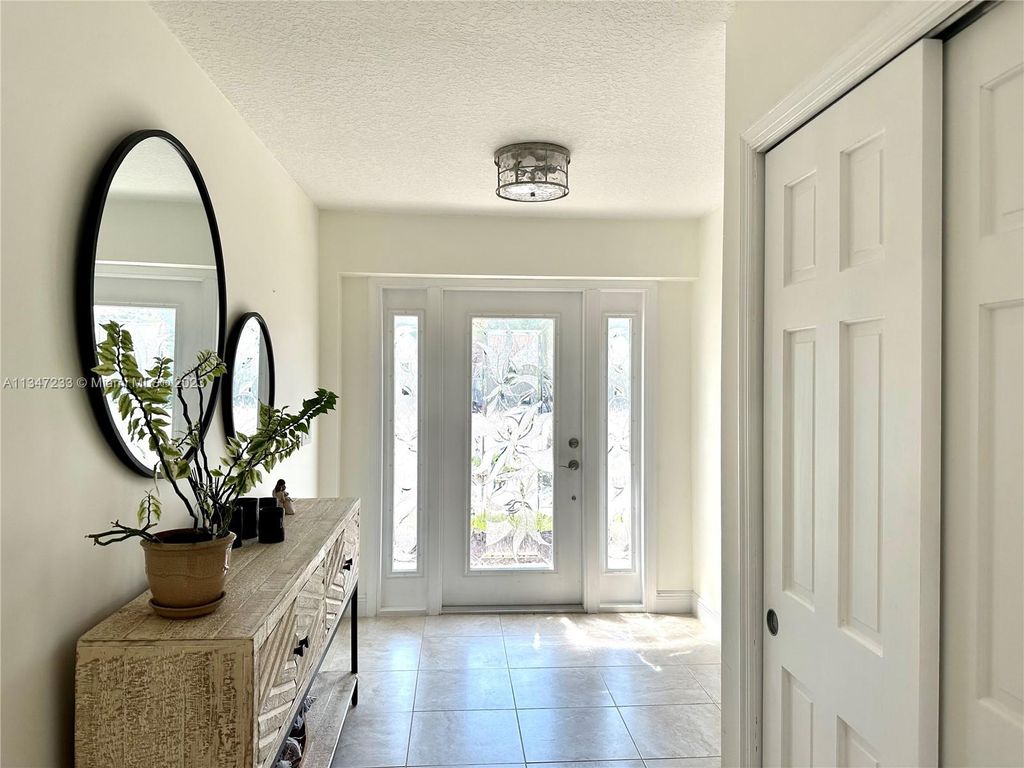 Photo of 2855 Biarritz Dr, Palm Beach Gardens, FL 33410 (MLS # A11347233)