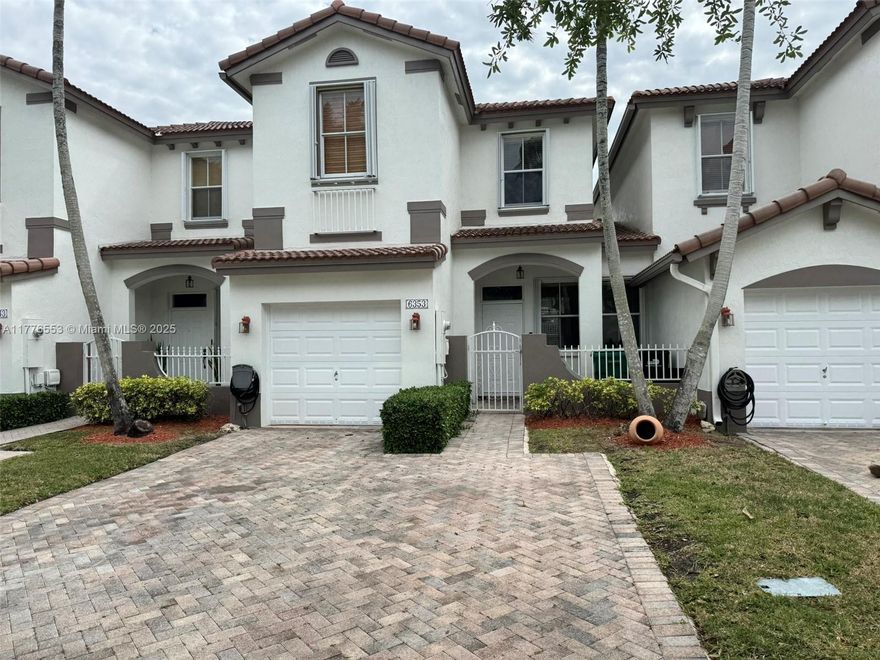 Welcome to this charming home in the heart of West Kendall. 3 bedrooms, 2.5 bathrooms townhome with an additional flex room downstairs offering both comfort and style. Fenced yard, making it perfect for relaxing and entertaining. Located near top rated schools, shopping, dining and parks, this home is in a peaceful neighborhood with a low HOA that includes access to community pool and alarm.