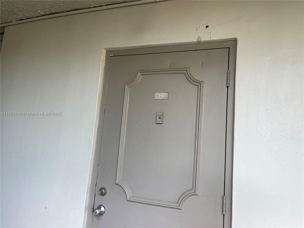 Photo of 9311 Orange Grove Dr #201, Davie, FL 33324 (MLS # A11773140)