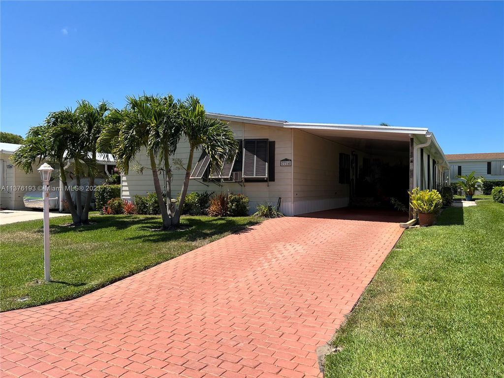 Photo of 7714 SE Saratoga Dr, Hobe Sound, FL 33455 (MLS # A11376193)