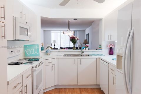 Photo of 7788 Trent Dr #311, Tamarac, FL 33321 (MLS # A11880997)