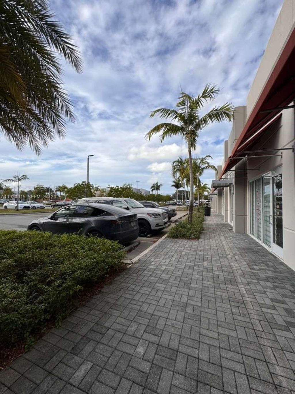 Photo of 9610 Stirling Rd #106, Cooper City, FL 33024 (MLS # A11934015)