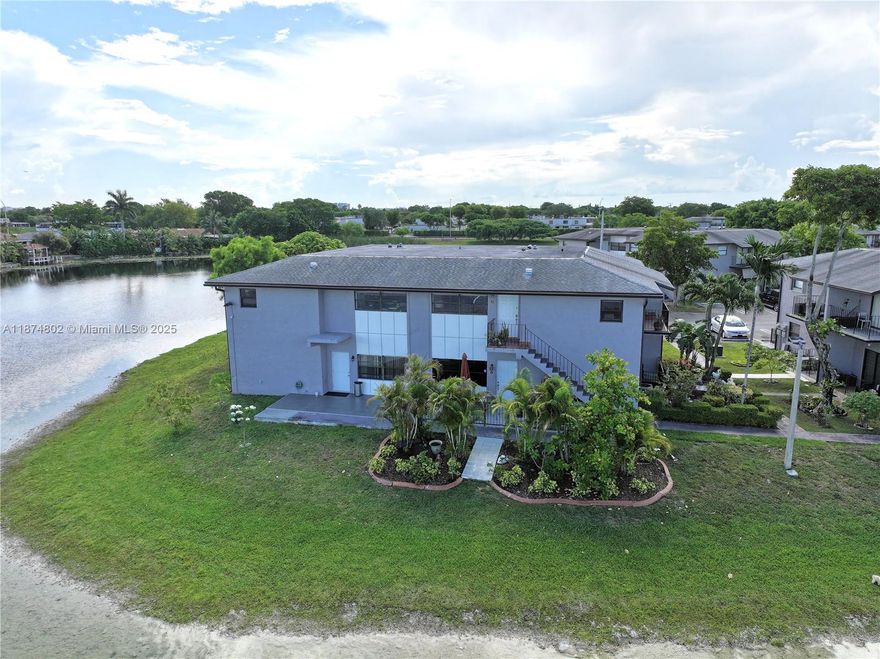 Rarely available. This is the largest unit situated in the only cul-de-sac within the community. Originally constructed as two units combined into one, it encompasses half of the building's second floor. The property is a corner unit boasting an impressive 1700+ square feet. The unit has been completely remodeled, featuring stainless steel appliances in the kitchen, and LED lighting throughout, complemented by ceramic flooring. This unit offers three bedrooms and two full bathrooms, with two bedroom's providing a balcony that overlooks the lake, and the sunset views are truly remarkable. Additionally, the unit includes a full laundry room. The community pool is located at the North/East corner of the property, just a few steps away.