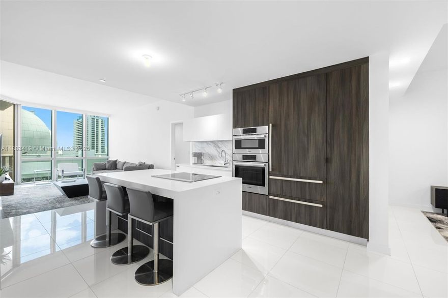 Live in the heart of Downtown Miami at the iconic Paramount Miami Worldcenter. This tastefully furnished 2 Bed + Den/3 bath residence features a spacious floor plan with a private foyer, 10ft ceilings, built out closets & large balcony. Gorgeous open kitchen with Italian cabinetry, Bosch & Subzero appliances, and a large master suite with a luxurious bathroom. Amenities include an outdoor soccer field, rooftop pool, two tennis courts, a boxing studio, golf simulator, an indoor basketball court, rooftop observatory, game room, children’s playroom, movie theater and more. Residents also enjoy access to local amenities such as Bayfront Park & Marketplace, Kaseya Center, easy access to the Airport, Miami Beach and Brickell plus the numerous museums, restaurants, and cafes.