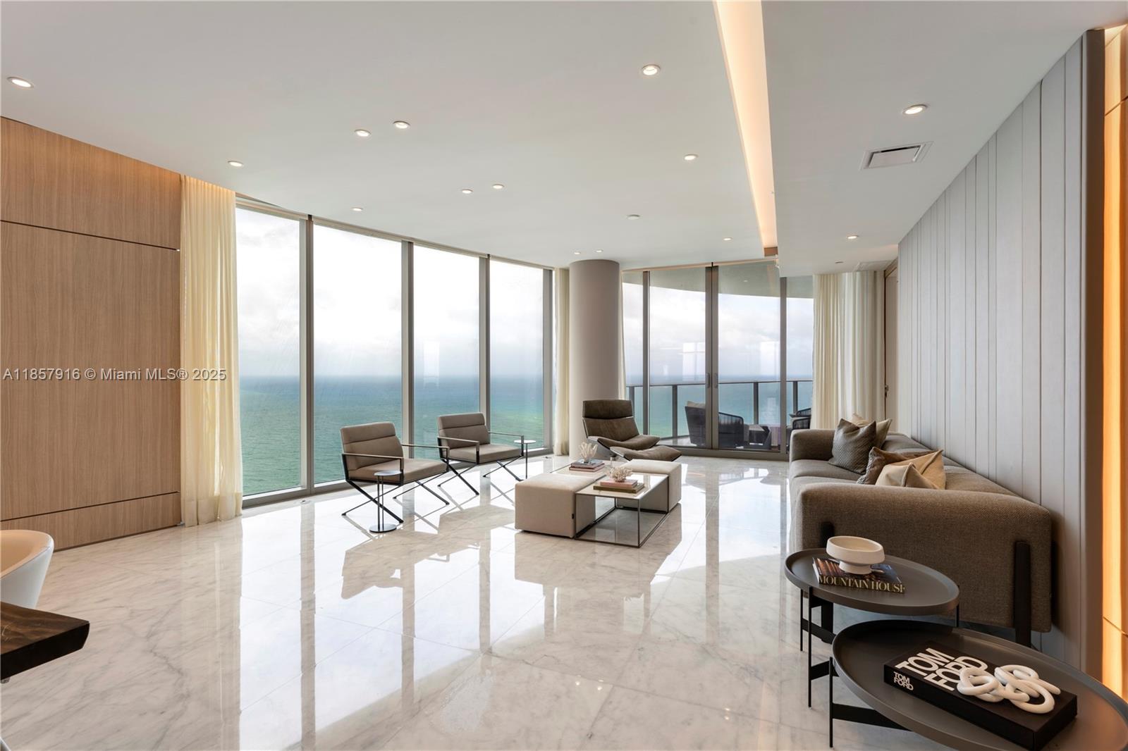 Welcome to Ritz Carlton Residences #3901 - MUST SEE Unit! Remodeled with high end millwork panels, throughout the main areas, with an option of the cozy family room to become a 4th bedroom, with gorgeous sliding doors. With Ocean and bay views, this 3 Bedrooms, 3.5 baths + maids quarter unit is been offered furnished.