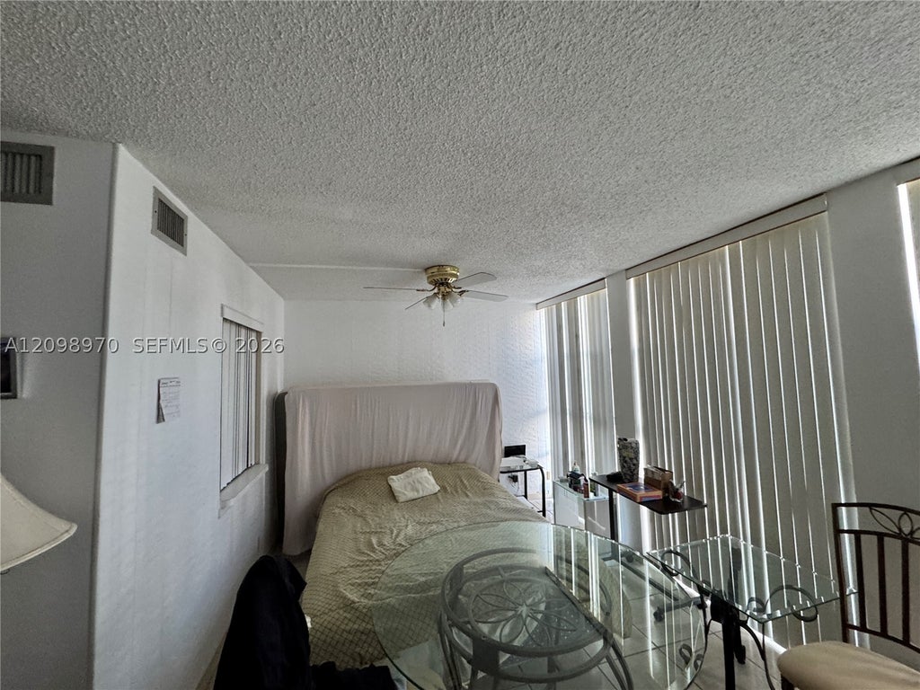 Photo of 701 Three Islands Blvd #103, Hallandale Beach, FL 33009 (MLS # A12098970)