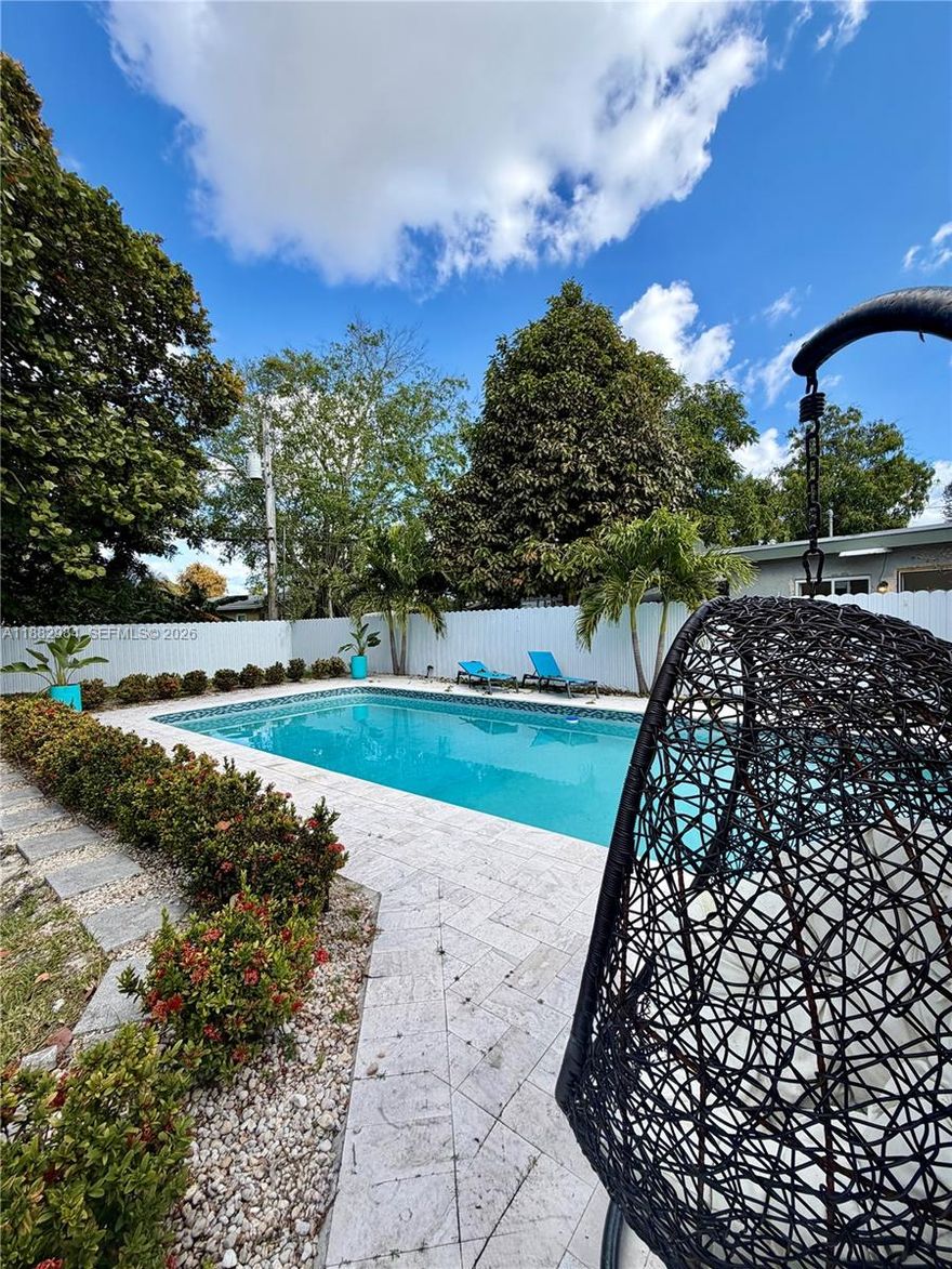 Welcome to this beautifully updated single-family home featuring 3 bedrooms and 2 bathrooms. The interior is filled with natural light from expansive windows, creating a bright and welcoming atmosphere. Step outside to your private backyard oasis, complete with a refinished pool and travertine deck—ideal for relaxing or entertaining guests. The spacious fenced yard is perfect for pets and offers room to park an RV or boat. Conveniently located near vibrant Wilton Manors and downtown Fort Lauderdale, you’ll enjoy easy access to top restaurants, shopping, and nightlife. The generous front yard also provides opportunities for your own landscaping projects. This move-in ready home blends comfort, style, and location—don’t miss the chance to make it yours!