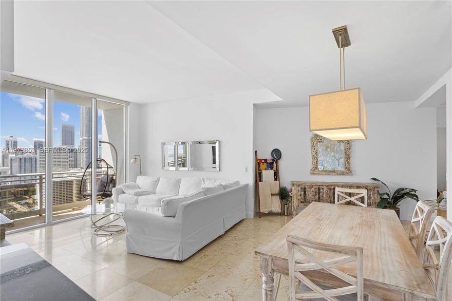 Experience this oversized 1BD / 1.5BA residence in the exclusive Carbonell, located on the peaceful  island of Brickell Key. Enjoy the ocean breeze from the oversized balcony with sweeping views of Key Biscayne, Brickell Bay, and Brickell Key Park.

This home features renovated kitchen cabinets, marble floors throughout the living areas, recently installed tile in the bedroom, a Samsung washer/dryer, a walk-in master closet, and modern appliances, providing both comfort and style.

Carbonell offers luxury amenities such as a world-class gym, basketball & racquetball courts, an expansive pool deck, and more. Embrace the serene Brickell Key lifestyle,  perfect for a Brickell professional or anyone looking to enjoy spectacular views of the bay and skyline while working from home.