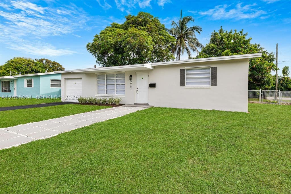 Photo of 5937 NW 16th Ct, Sunrise, FL 33313 (MLS # A12065601)
