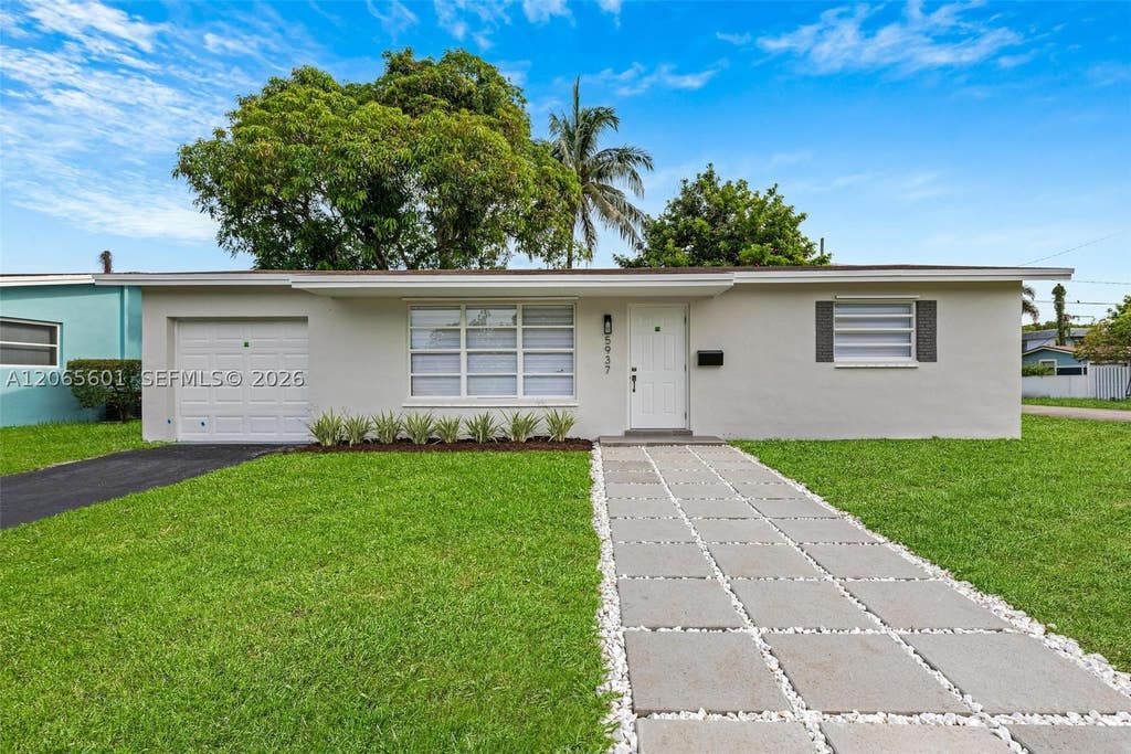 Photo of 5937 NW 16th Ct, Sunrise, FL 33313 (MLS # A12065601)