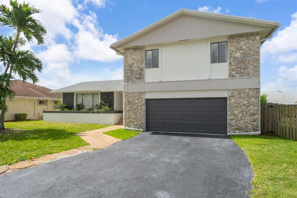 Photo of 9340 NW 32nd St, Sunrise, FL 33351 (MLS # A12030672)