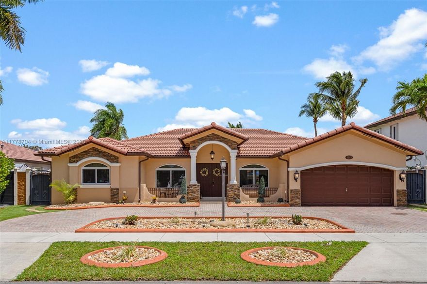 This beautifully remodeled home combines modern luxury with unparalleled family living comfort. Boasting 4 spacious bedrooms, 3 baths, office space and a chef-inspired kitchen with custom cabinetry, quartz countertops, and high-end stainless-steel appliances, it's perfect for entertaining. Enjoy a private backyard oasis with a large pool, ideal for relaxation and hosting. Set on an oversized lot with circular driveway and NO HOA, this home offers privacy and convenience. along with 2 car garages, hurricane-impact windows, Located minutes from Top A+ schools, fine dining, shopping, parks and much more.!! Move-in ready and nestled in one of West Kendall's most desirable neighborhoods, this remarkable property won’t last long. Don’t miss your chance to own this exceptional home!