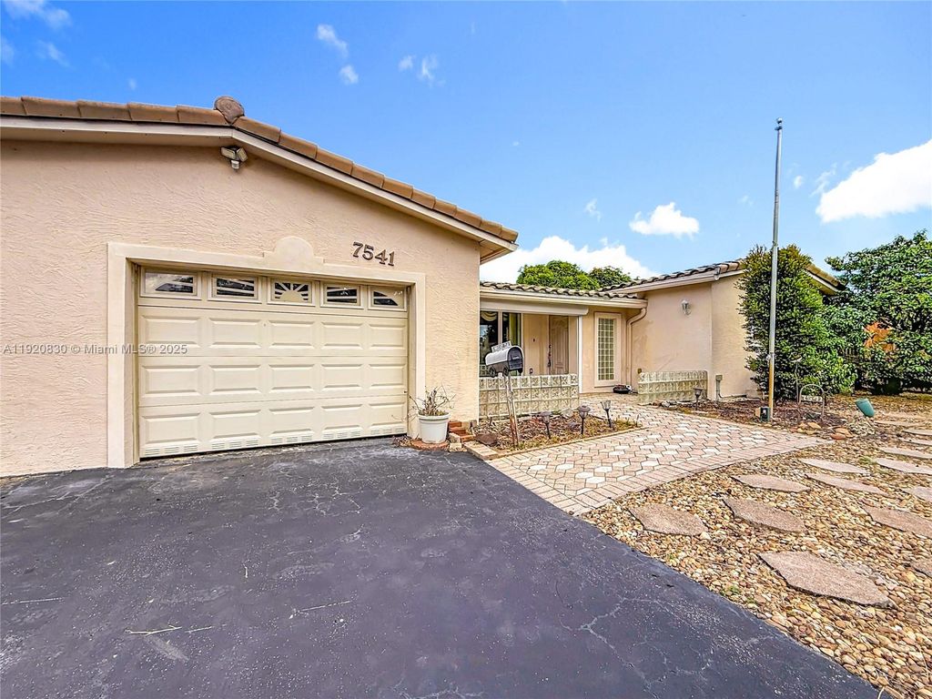 Photo of 7541 Embassy Blvd, Miramar, FL 33023 (MLS # A11920830)