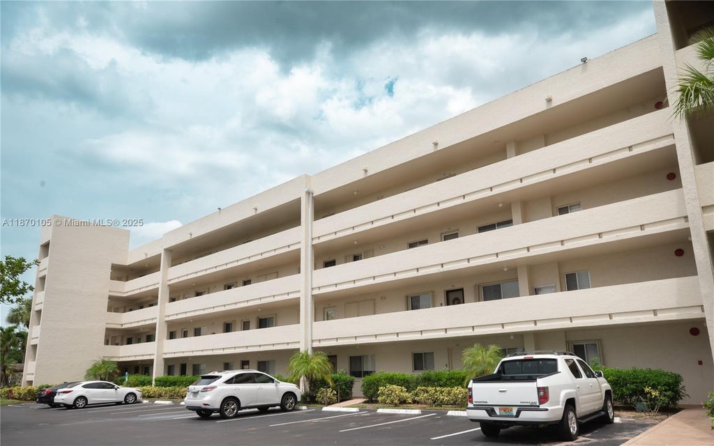 Photo of 3178 Via Poinciana #303, Lake Worth, FL 33467 (MLS # A11870105)