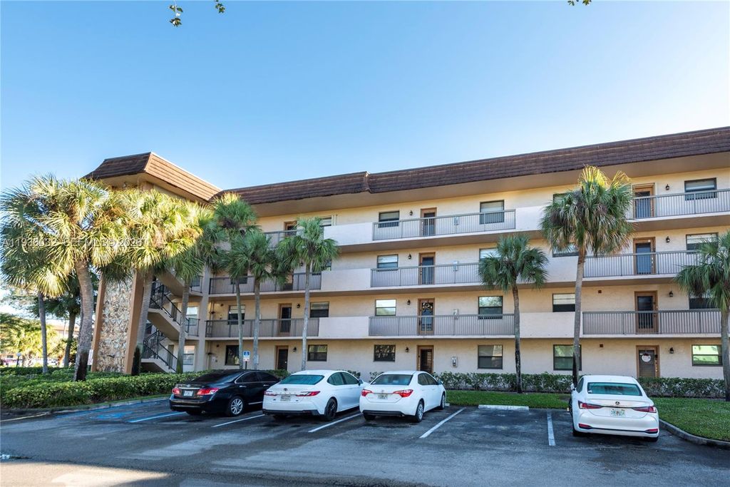 Photo of 4970 E Sabal Palm Blvd #405, Tamarac, FL 33319 (MLS # A11936032)