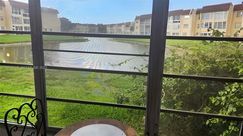 Photo of 8861 Sunrise Lakes Blvd #106, Sunrise, FL 33322 (MLS # A11830515)