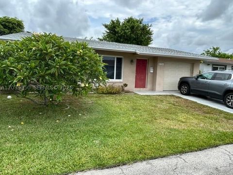 Photo of 5711 NW 48th Ter, Tamarac, FL 33319 (MLS # A12034350)