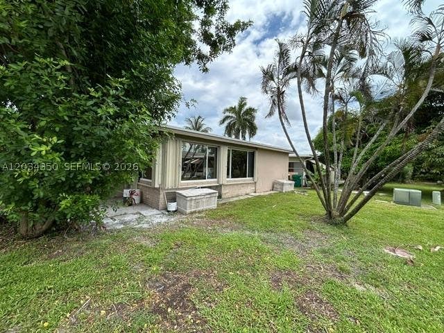 Photo of 5711 NW 48th Ter, Tamarac, FL 33319 (MLS # A12034350)