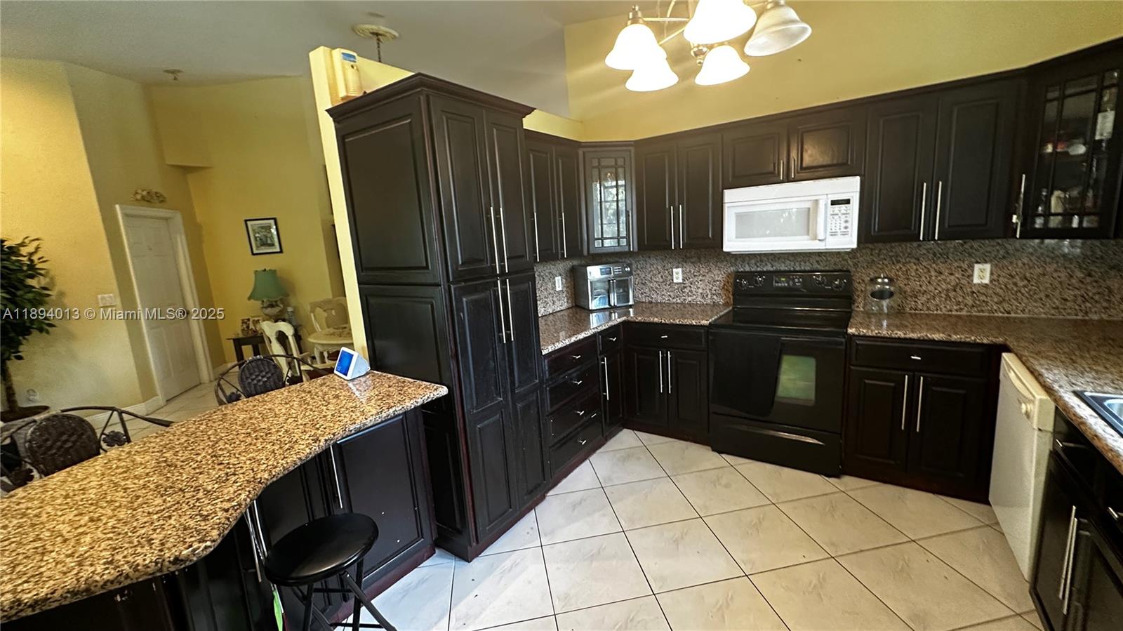 View photos, virtual tours, details... 6391 SW 20th St