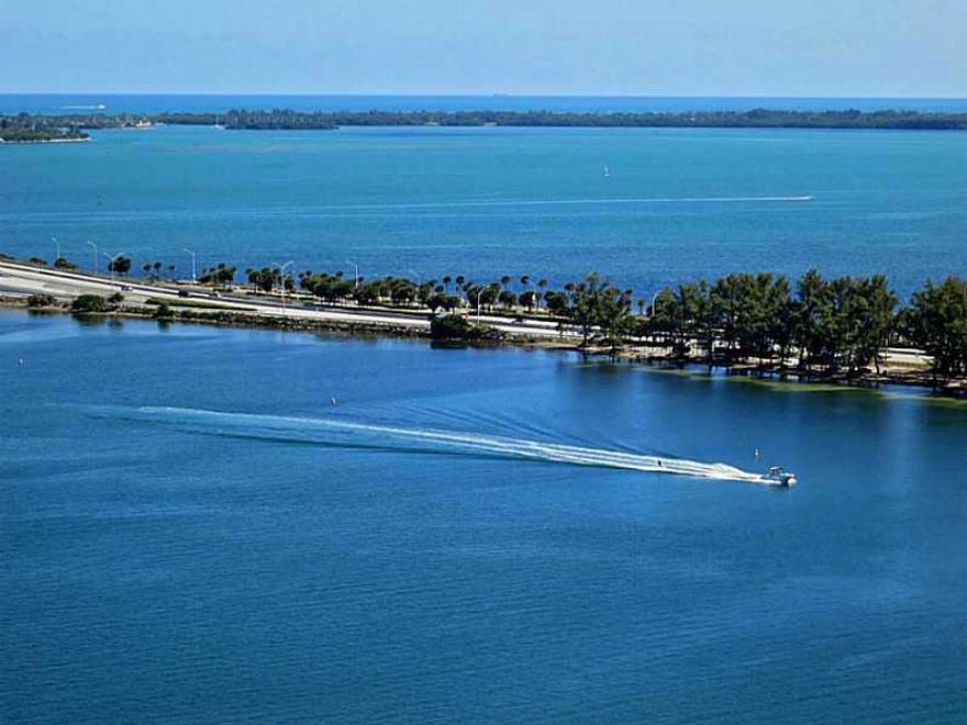 Enjoy the quality of this Ugo Colombo signature tower. Spectacular unit designed by renowned interior designer SAM ROBIN. Attractively priced for this 5B& 5.5BA, fully furnished residence. Contemporary architecture features and fine finishes. Grand living  spaces with impressive views of Biscayne Bay, Ocean & magical city lights. Room Office. Expansive Master suite. Media room. Private Elevator entry. Smart Home technology touch screen monitor. The exterior is as spectacular as the interior.