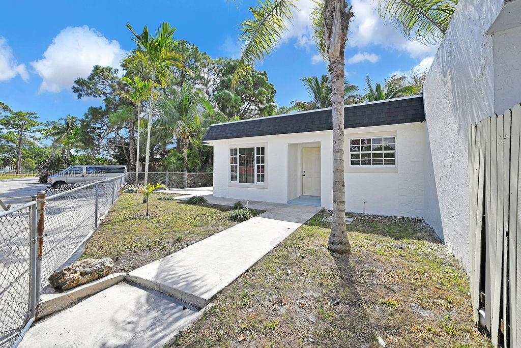 Corner unit townhouse with plenty of space for entertainment outside only one neighbor large area behind the house. Brand new roof just installed. New waterproof vinyl flooring walk. This unit will not be disappointed near all major highways and dolphins stadium. Very low taxes