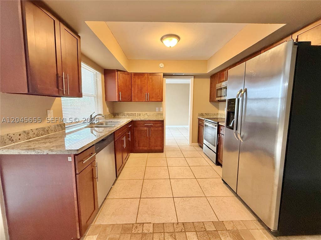 Photo of 1154 SW 27th Ave, Boynton Beach, FL 33426 (MLS # A12045655)