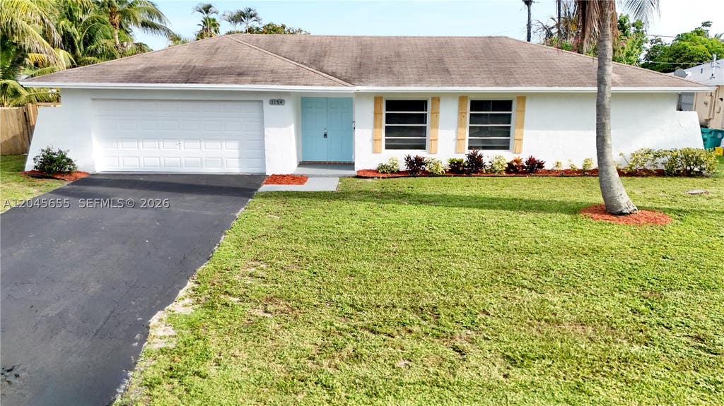 Photo of 1154 SW 27th Ave, Boynton Beach, FL 33426 (MLS # A12045655)