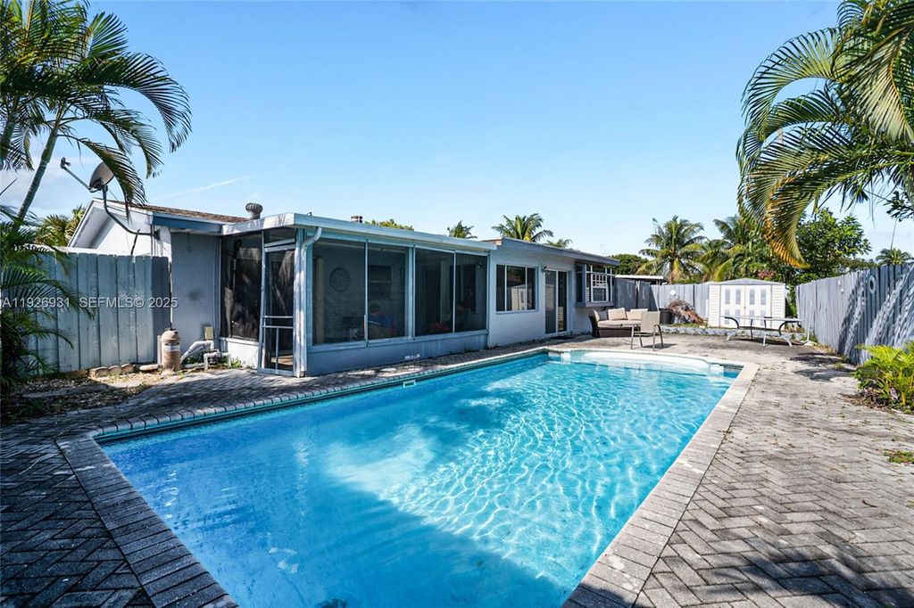 Photo of 3010 NE 10th Ter, Pompano Beach, FL 33064 (MLS # A11926931)