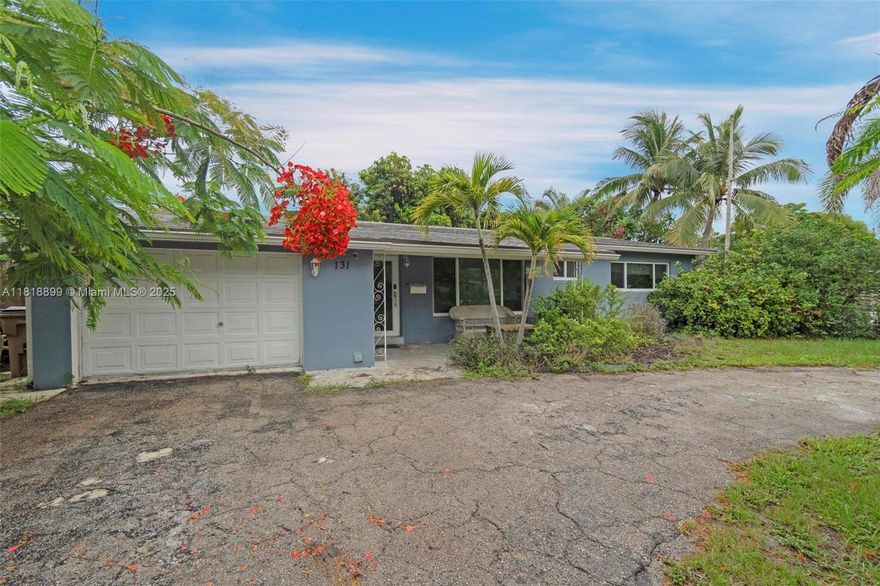 This beautifully updated 3 bedroom, 2 bathroom home in Deerfield Beach, just minutes from the ocean! The fully renovated kitchen boasts modern finishes and stainless steel appliances. Impact doors and windows have been installed throughout the home. A spacious room offers extra flexibility, and the converted garage is currently used as a fourth bedroom perfect for guests or extended family. The home sits on a high lot with a generous backyard, ideal for entertaining or relaxing. This property is perfect as a primary residence. Enjoy the best of South Florida living close to beaches, dining, shopping, and more.