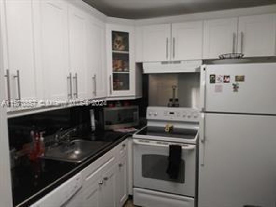 Recently updated ground floor unit.  Beautiful flooring in entire apartment. White shaker cabinets with matching white appliances & granite countertops. Bathrooms have raised toilets. A/C just replaced. Roll-up shutters on patio. 
55 plus gated community in Boca Raton. Beautiful club house, great entertainment, free movies , shows, inside pool, sauna room, billiards room, card games, courtesy bus. Close to local stores, restaurants and pharmacies' great place to live as a resort lifestyle.