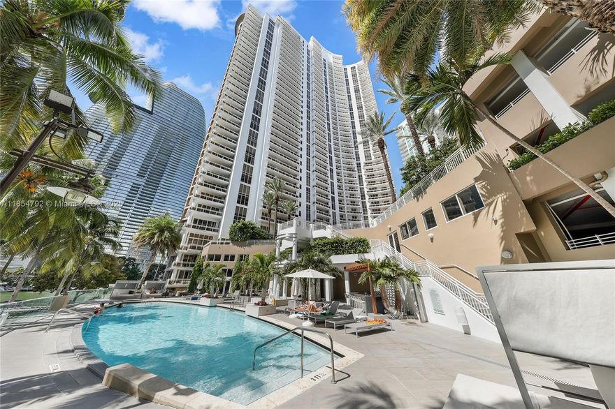 Stunning Bayfront Residence at Carbonell on Brickell Key - a spacious 1-bedroom, 1.5-bathroom residence offering 1,076 SF of living space. Soaring high ceilings and floor-to-ceiling windows frame sweeping views of Biscayne Bay and the iconic Miami skyline. This thoughtfully designed condo features an open-concept layout ideal for modern living, with a sleek kitchen, generous living and dining areas, and a large primary suite with a walk-in closet with water views. Located on exclusive Brickell Key, Carbonell offers world-class amenities including tennis courts, a state-of-the-art fitness center, racquetball court, sauna, waterfront pool, concierge, valet service, and 24-hour security.