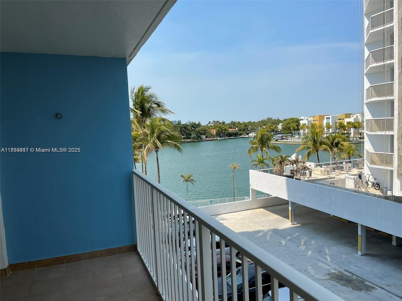 JUST RENOVATED AND PAINTED WITH WATER VIEW! New Blinds, New Lamps, New Bedroom Floor, New Electric Switches and Plugs, Freshly Painted, and more! Discover the waterfront by living in this freshly painted 1-bedroom 1.5 Bath unit, featuring a spacious balcony with views of the serene Bay and vibrant Collins Avenue. The large bedroom also offers a peaceful view of the bay, providing a relaxing retreat. The building includes convenient amenities like a gym, a waterfront pool deck, and laundry facilities right next to your door. Enjoy 24-hour front desk service and 1 included assigned parking space for added convenience. There is also ample guest parking. Located just across from the beach, this apartment combines comfort, style, and an unbeatable location