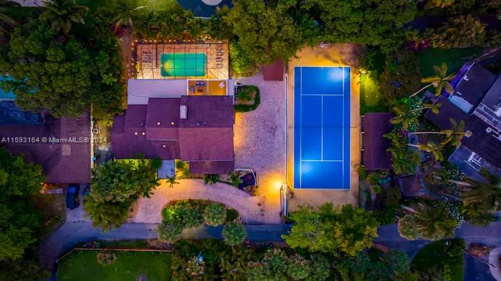 Come unwind in luxury at this beautiful secluded home in Ft Lauderdale, Florida. Stretch your legs and take a dip in a stunning, screen enclosed, outdoor pool or or get in a set on the full sized tennis court. Activities for the whole family. 5 gorgeous bedrooms 3 extravagant bathrooms, game room, spacious living room, full sized tennis court, half court basketball court, balcony, and much more, there is something for everyone! 15 minutes away from Ft Lauderdale Airport