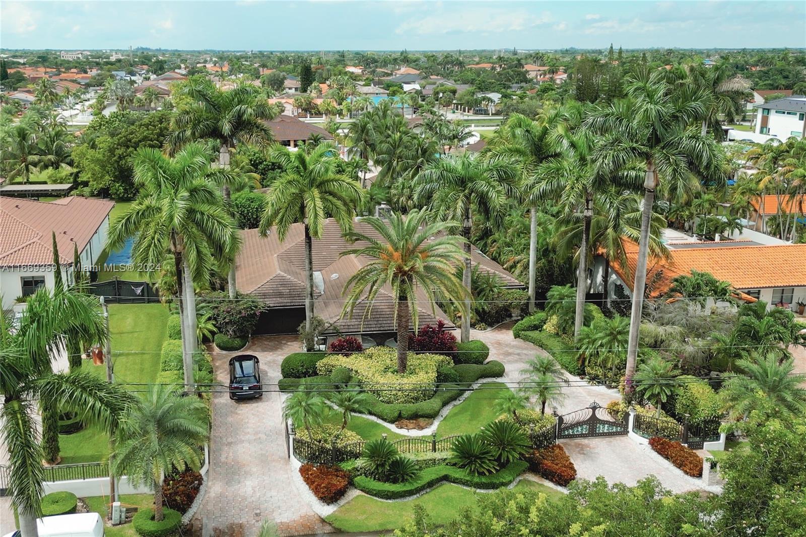 Discover luxury living in this exquisite 4-bedroom, 5-bathroom home located in the heart of Miami. Each spacious bedroom features an en-suite bathroom, offering comfort and privacy. The open-concept living area flows into a gourmet kitchen with premium appliances, perfect for entertaining. Step outside to your private oasis with a resort-style pool and relaxing spa, ideal for both gatherings and quiet nights. This home also includes a home office, lush landscaping, and is just minutes from Miami’s top attractions, beaches, and shopping. Don’t miss out on this rare opportunity!