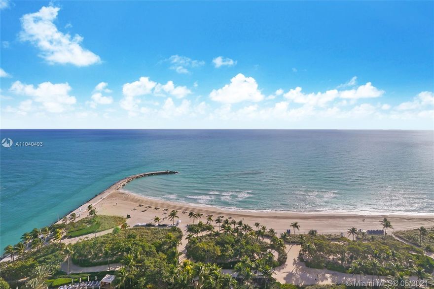 Live in one of the most exclusive neighborhoods in Bal Harbour Village. The Residences at ONE Bal Harbour is a pristine building that sits on the beach overlooking the ocean with Intracoastal waterways just where the ocean meets with Intracoastal inlet. The building is only 185 private residences with flow-through floor plans with 5 stars hotel services provided by the Ritz Carlton Bal Harbors all inclusive. The property offers panoramic views from east to west from every room, tastefully decorated for an exceptional life. The floor plan has been improved with a den and third full bathroom. The location offers world class shopping, exclusive golf membership, access to the international airports and seaports, a venue of restaurants, 5 stars hotels,private and luxury transportation services.