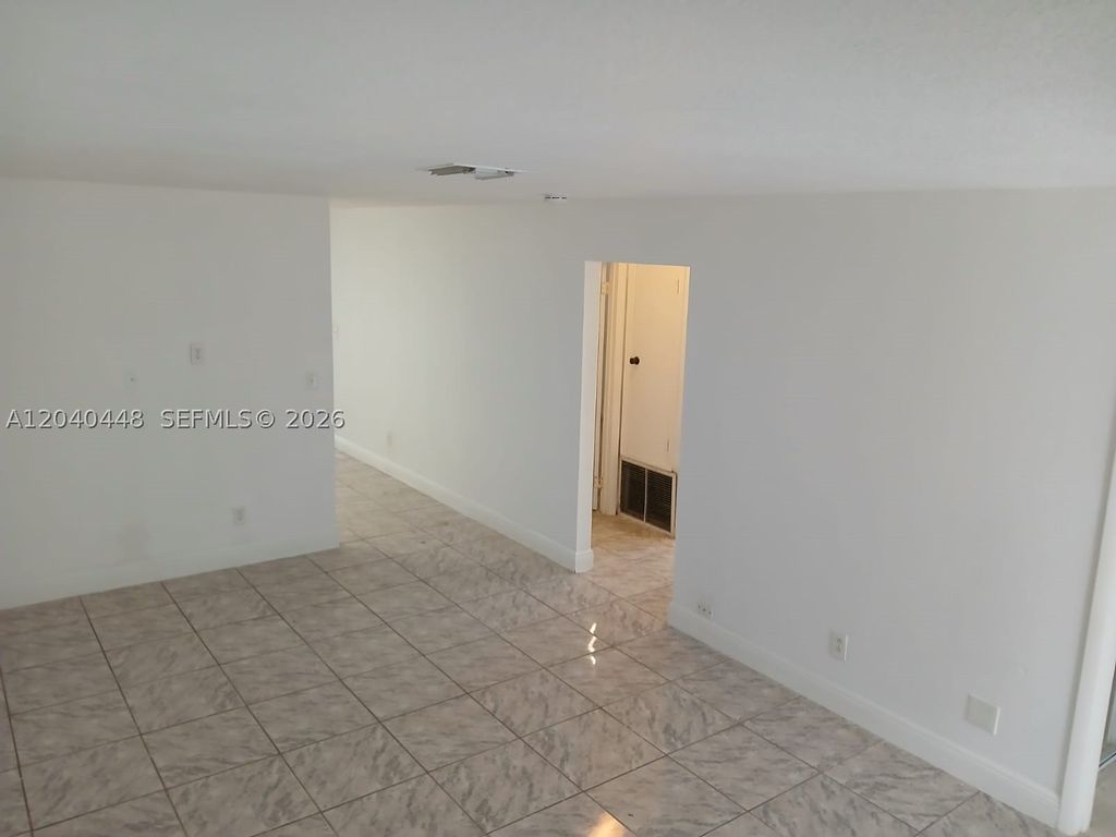 Photo of 7318-7320 NW 76th Dr, Tamarac, FL 33321 (MLS # A12040448)