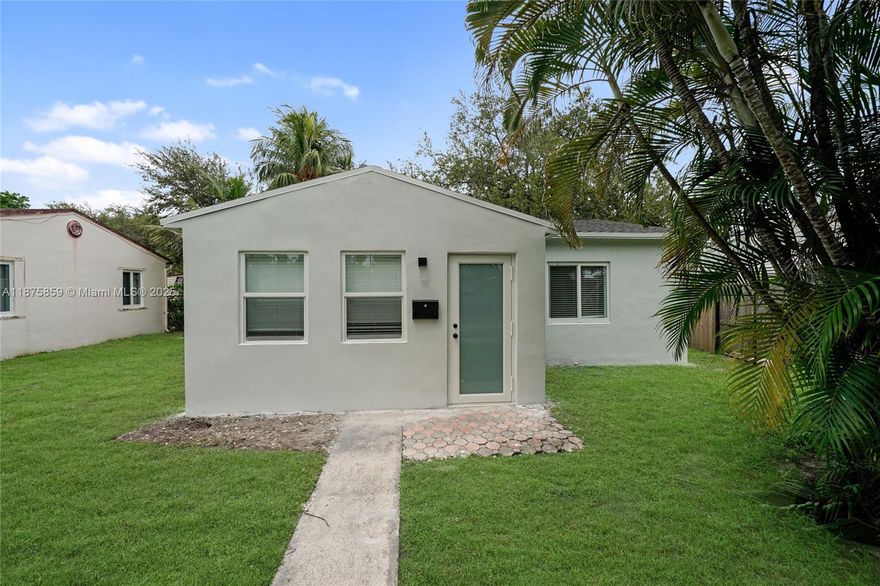 Fully renovated 2-bedroom, 1-bathroom home with space to easily add bathroom. This stunning residence features a new roof, impact windows, updated electrical, and new plumbing—move-in ready with the option to live in or use as an AirBnB. Situated on a huge 9,500 sq. ft. lot, the property offers multiple possibilities: enlarge or expand the current home, or take advantage of the prime redevelopment potential to build a duplex or up to three townhouses. This is a rare opportunity to own a beautifully renovated home with tremendous value and future upside in a rapidly redeveloping area. Conveniently located just minutes from I-95, shopping centers, gas stations, and schools. Vacant and easy to show—schedule your preview today!