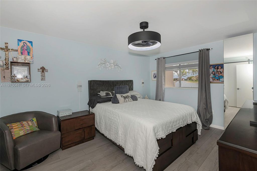 Photo of 13705 SW 12th St #104B, Pembroke Pines, FL 33027 (MLS # A11975041)