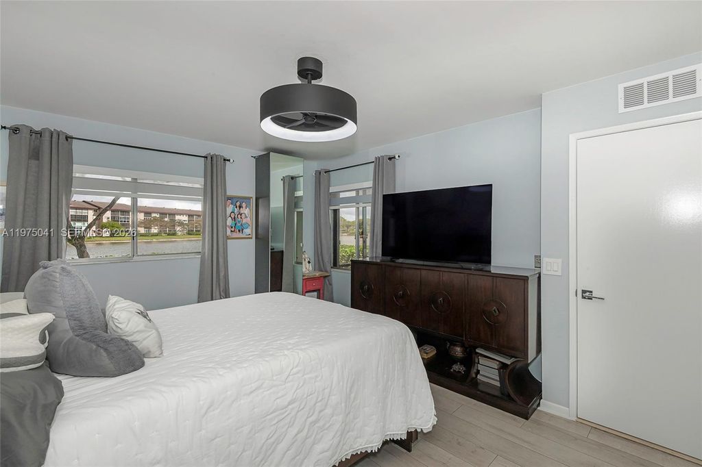 Photo of 13705 SW 12th St #104B, Pembroke Pines, FL 33027 (MLS # A11975041)