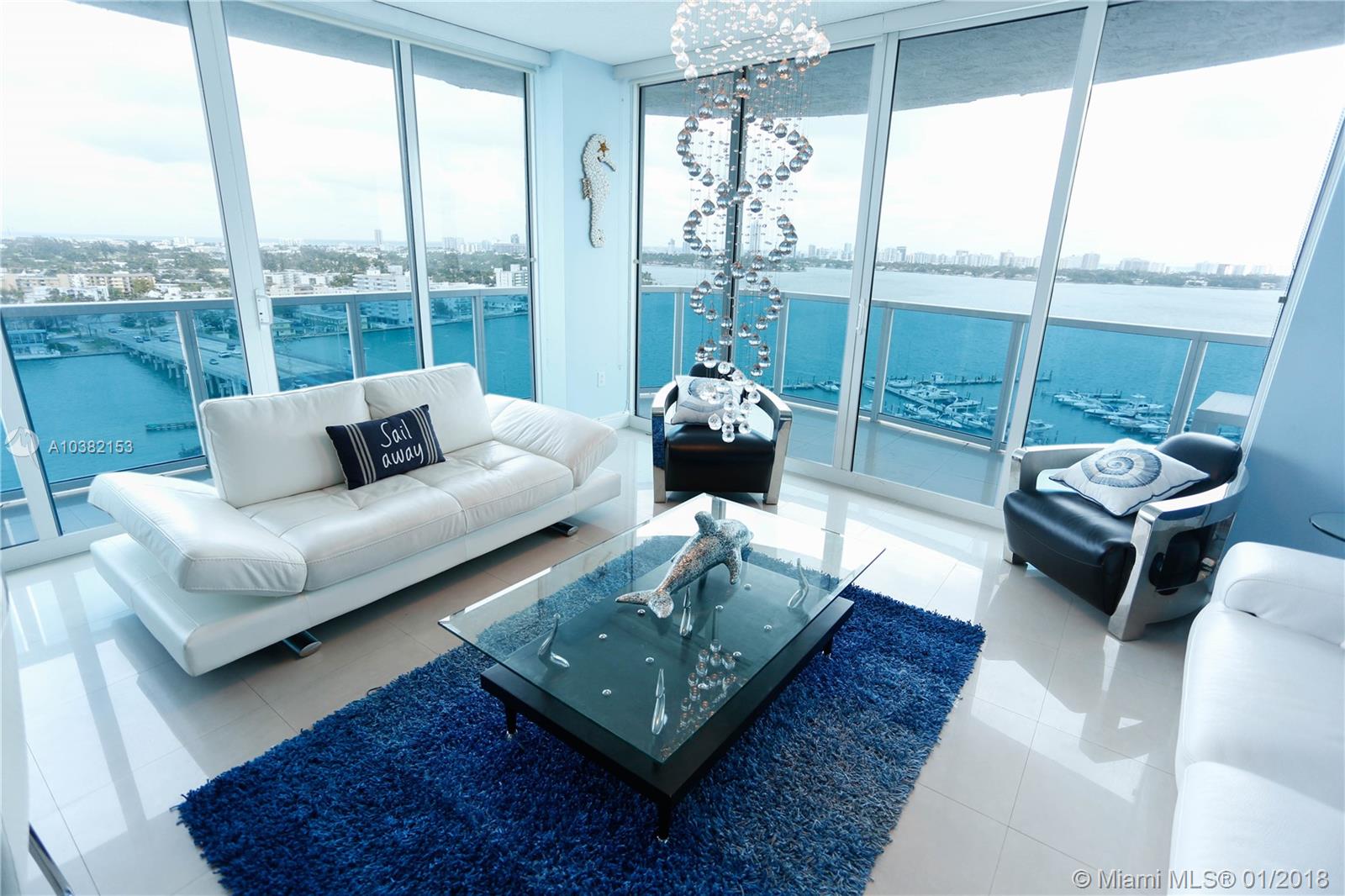 *See Youtube Video* THE BEST UNIT IN THE BUILDING, WITH THE BEST WATER VIEW! Take a deep breath for STUNNING EXPANSIVE HEART PALPITATING BAY/OCEAN VIEWS!! Modern SE Corner Unit at prestigious full service Bridgewater, 2BD/2.5BA. See the Bay, Ocean, Miami Beach, Downtown all in one wrap around balcony & floor to ceiling windows ... Shining white Porcelain floors thru-out. Washer/dryer, Additional storage, covered parking . . . Modern Pool, Gym, Jacuzzi, Barbecue, Business Center, concierge & Restaurants of every cuisine at the ocean end of Causeway