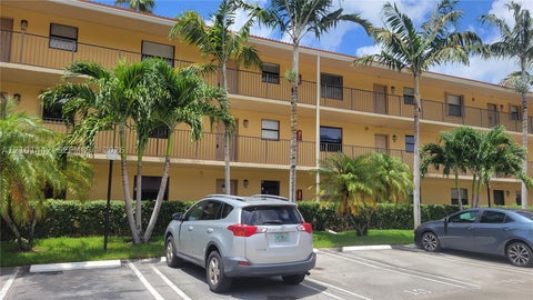 Photo of 11477 NW 39th Ct #202-1, Coral Springs, FL 33065 (MLS # A12101442)