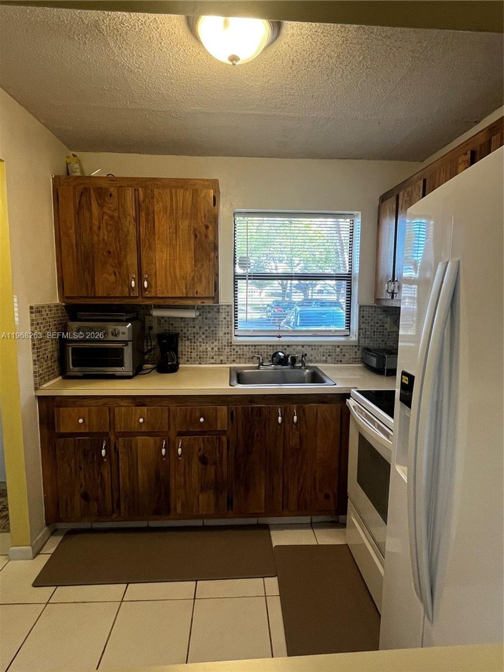 Photo of 10444 NW 30th Ct #105, Sunrise, FL 33322 (MLS # A11968263)