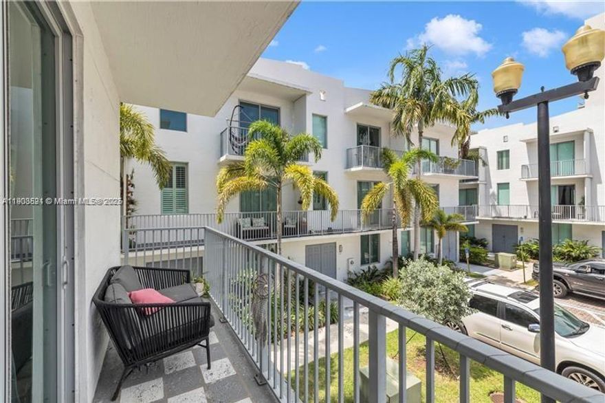 Live & entertain in sophisticated corner unit. Privacy awaits you, with minimal upkeep! Fully renovated 4-bed, 3.5-bath townhome in the heart of Hollywood. Kobi Karp Designed with high-end finishes & upgrades throughout, this OPEN-CONCEPT living features soaring ceilings, chef’s kitchen, formal dining, breakfast bar & spacious balcony. Large Impact windows sunlight, greenery, & serenity. Upstairs, 3 bedrooms are thoughtfully placed, with a luxurious primary suite, balcony, walk-in closets, whirlpool tub, dual vanities & separate shower. Lower level-Barn Door opens to private bed/full bath-plus direct access to 2 car garage plus two other designated spots. Walk to houses of worship, hollywood circle, publix, restaurants, shopping, with beaches, airport, Hard Rock Casino just minutes away.