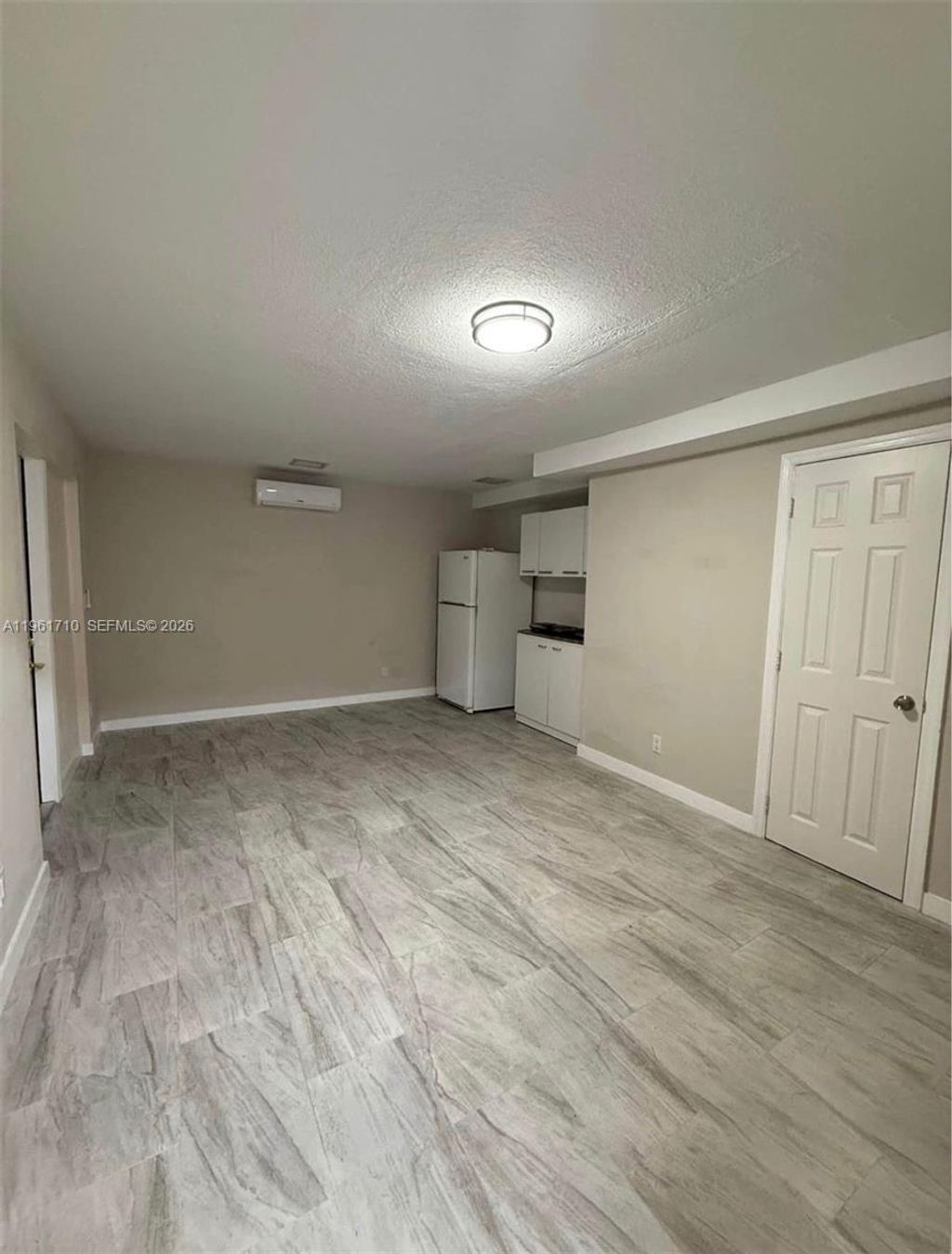 Photo of 1605 NW 11th Pl #2, Fort Lauderdale, FL 33311 (MLS # A11961710)