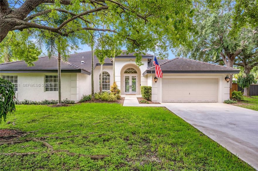 Stunning Mediterranean Oasis! Built in 1996 with a new roof installed in 2020, this spectacular 5-bedroom, 3-full-bath home perfectly blends timeless elegance with peace of mind. Step inside to an expansive split floor plan featuring soaring 15-foot ceilings and sleek tile flooring throughout.

The heart of the home is the beautifully updated eat-in kitchen, boasting premium stainless steel appliances, wood cabinets and a functional center island. Ideal for hosting, the adjacent family room features a custom wet bar and wine cooler. All three full bathrooms have been stylishly updated, offering a completely turn-key experience.

Your private backyard paradise awaits! Relax or entertain on the spacious patio, or take a refreshing dip in the pristine, heated pool complete with a salt system. Additional features include a 2-car garage and magnificent curb appeal. Schedule your tour today!