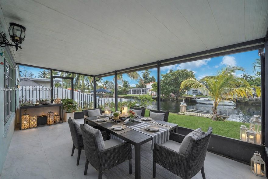 Elegant 3BR/2BA waterfront residence with ocean access in the heart of Hollywood, Florida, thoughtfully updated with refined finishes throughout. The home features an open-concept kitchen, a well-designed split floor plan, and timeless tile flooring. Enjoy seamless indoor-outdoor living with a screened-in patio overlooking the water. A private dock and boat lift provide direct ocean access, ideal for boating enthusiasts. Perfectly positioned minutes from major highways, Fort Lauderdale Airport, pristine beaches, Dania Pointe, premier shopping, dining, and nearby parks. An exceptional offering that blends comfort, convenience, and the sophistication of waterfront living.