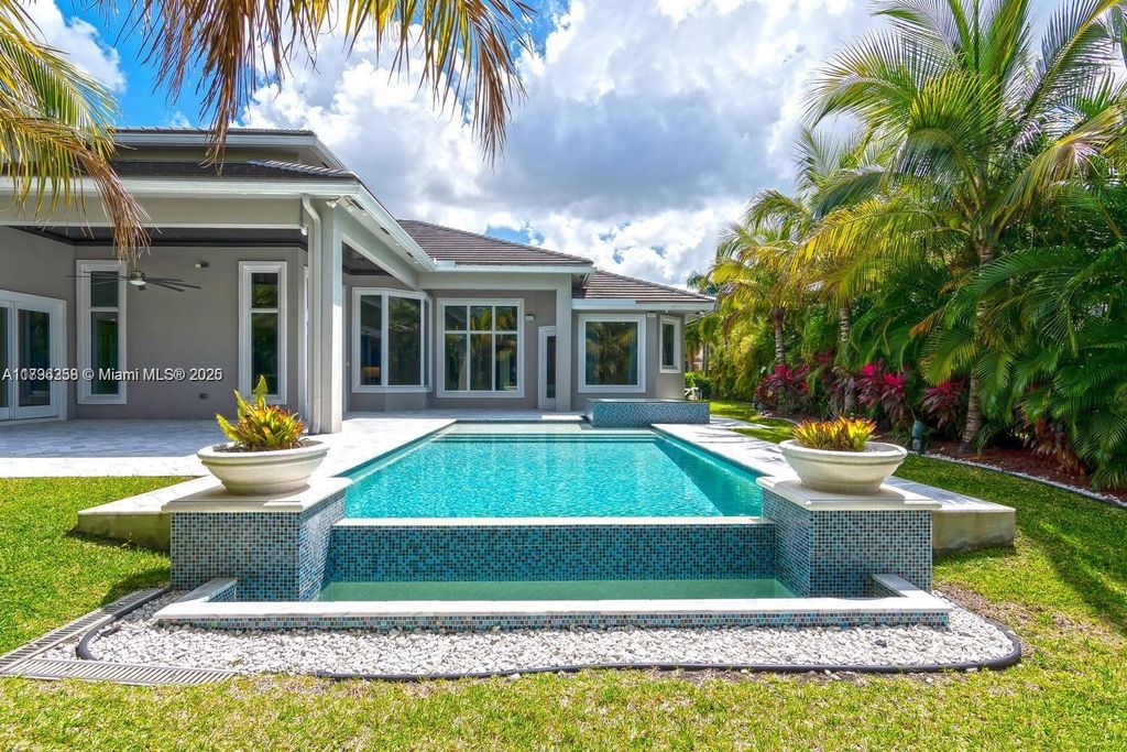 Photo of 10181 Key Plum St, Plantation, FL 33324 (MLS # A11796258)