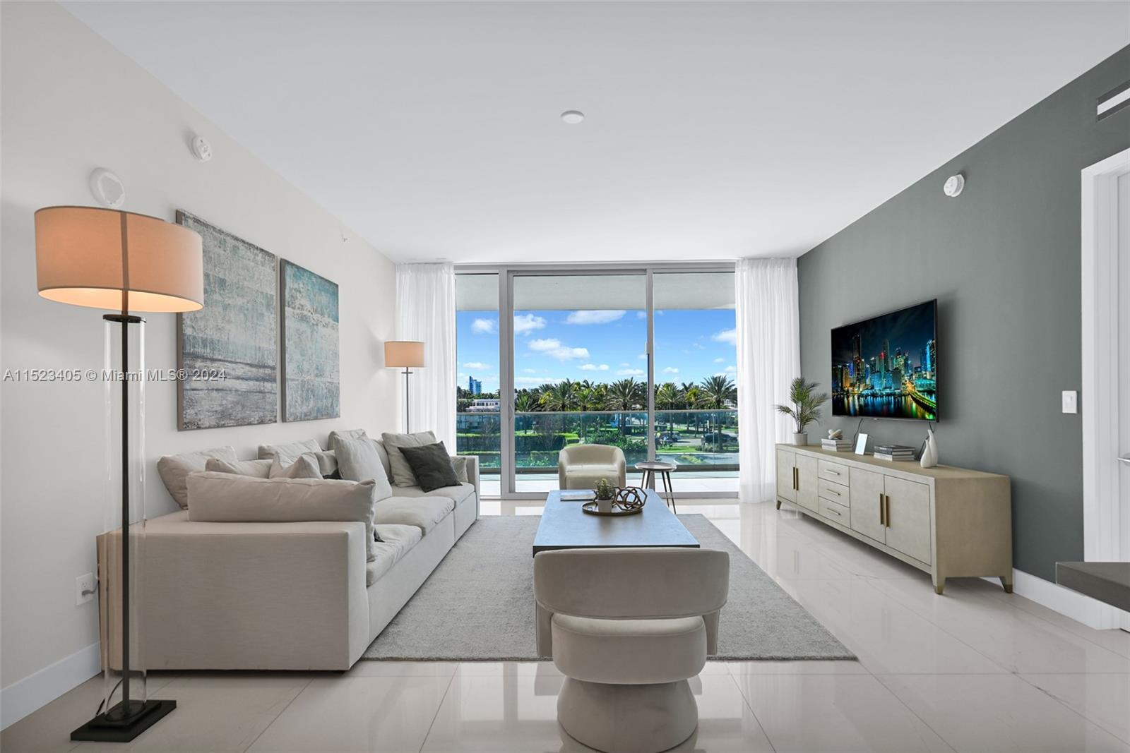 This generously sized residence, oriented to the West, boasts 2 BD & 2.5 BA, carefully designed with contemporary organic details, featuring light wood & marble throughout. Abundant natural light floods through the floor-to-ceiling windows, & a spacious glass terrace extends across the entire unit, providing an ideal spot to witness the breathtaking sunsets of Miami. Serving as a genuine beach retreat, the space highlights an open kitchen with a sizable island, Gaggenau appliances, & a wine cooler. The primary suite offers a spa-like bathroom with a glass-encased shower, soaking tub, dual vanities, & custom walk-in closets. Enjoy a 5-star lifestyle with incredible community amenities including 24/7 concierge, beach service, private poolside restaurants, world-class spa, cabanas & more.