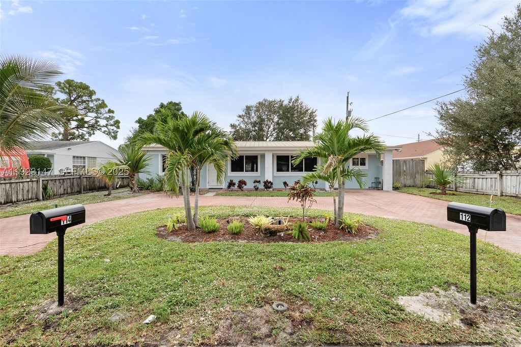 Photo of 112 Milton St, Lantana, FL 33462 (MLS # A11923147)